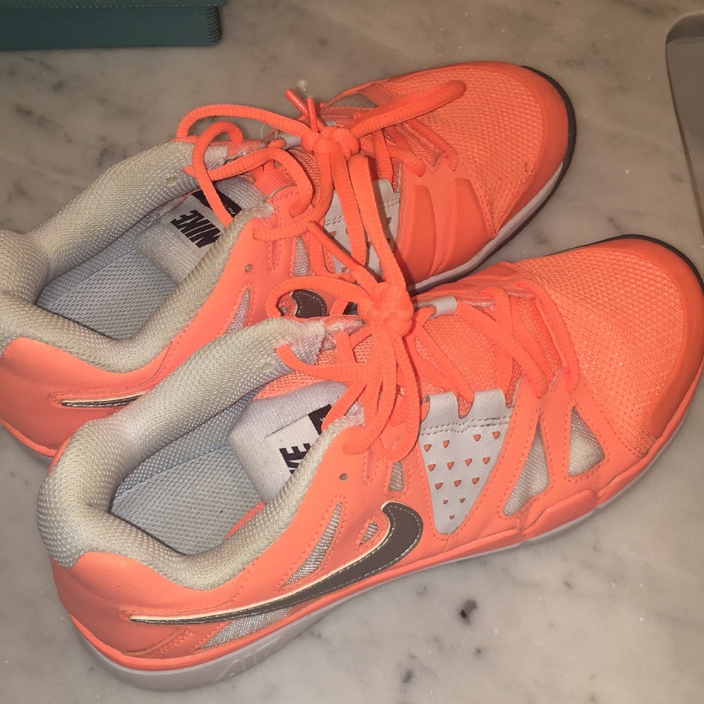Nike vapor advantage tennis shoes.